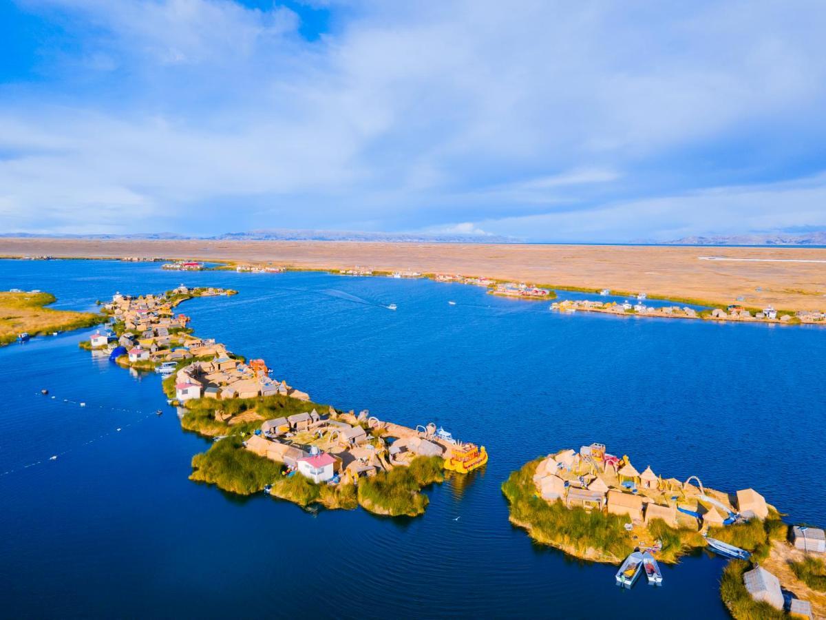 Ghl Hotel Lago Titicaca Puno Exterior foto Aerial view of the floating village of Suq